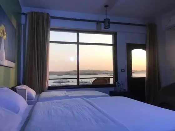 Deluxe Tek Büyük veya İki Ayrı Yataklı Oda