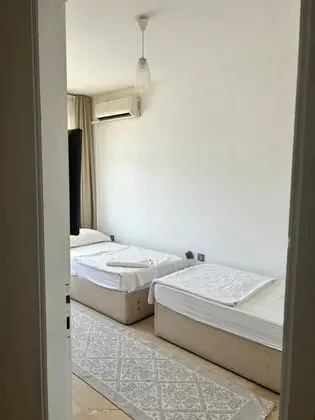 Ekonomik Oda - İki Ayrı Yataklı,Bahçe veya Sokak Manzaralı,1. Kat