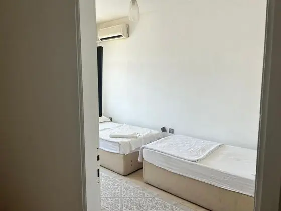 Ekonomik Oda - İki Ayrı Yataklı,Bahçe veya Sokak Manzaralı,1. Kat