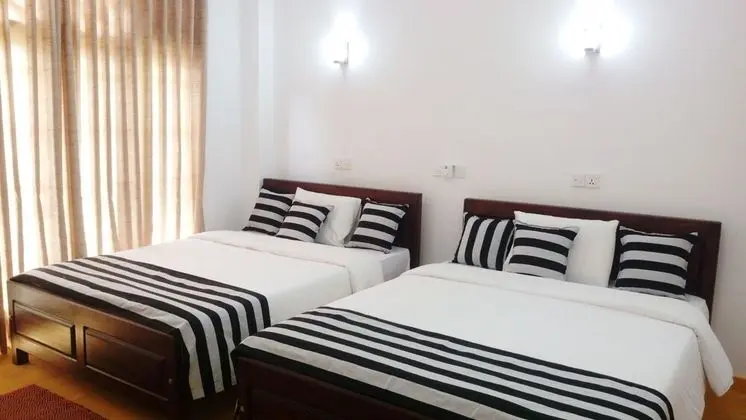 Deluxe Dört Kişilik Oda