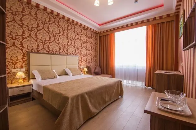 Deluxe Tek Büyük veya İki Ayrı Yataklı Oda