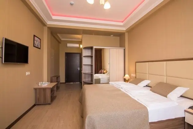 Deluxe Tek Büyük veya İki Ayrı Yataklı Oda