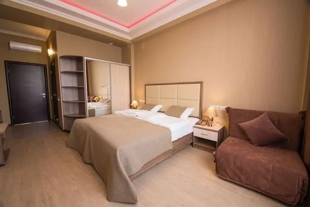 Deluxe Tek Büyük veya İki Ayrı Yataklı Oda