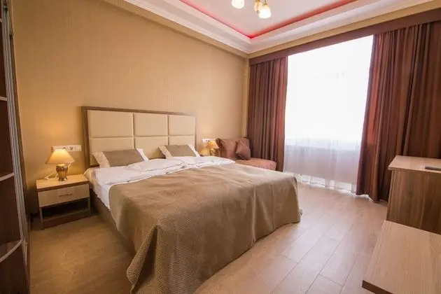 Deluxe Tek Büyük veya İki Ayrı Yataklı Oda