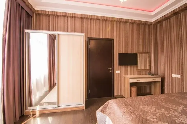 Deluxe Tek Büyük veya İki Ayrı Yataklı Oda