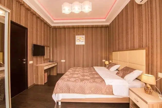 Deluxe Tek Büyük veya İki Ayrı Yataklı Oda