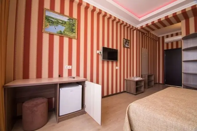 Deluxe Tek Büyük veya İki Ayrı Yataklı Oda