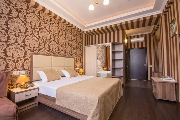 Deluxe Tek Büyük veya İki Ayrı Yataklı Oda