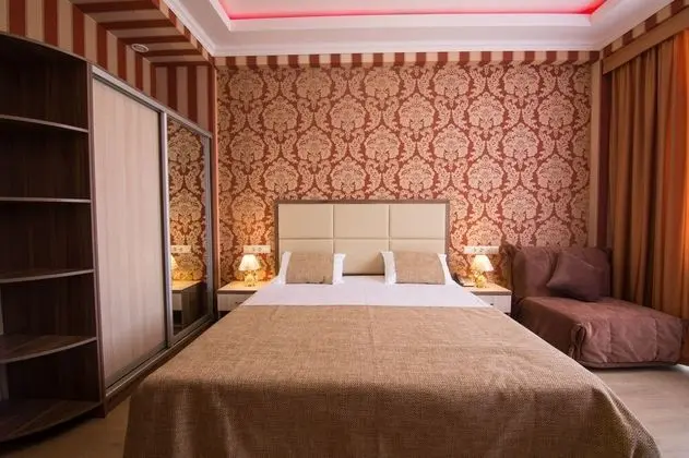 Deluxe Tek Büyük veya İki Ayrı Yataklı Oda