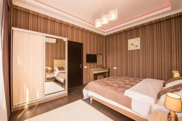 Deluxe Tek Büyük veya İki Ayrı Yataklı Oda