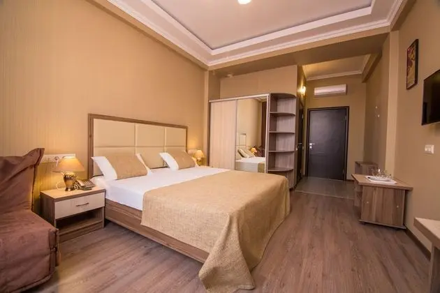 Deluxe Tek Büyük veya İki Ayrı Yataklı Oda