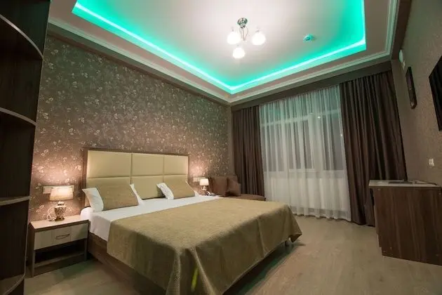 Deluxe Tek Büyük veya İki Ayrı Yataklı Oda