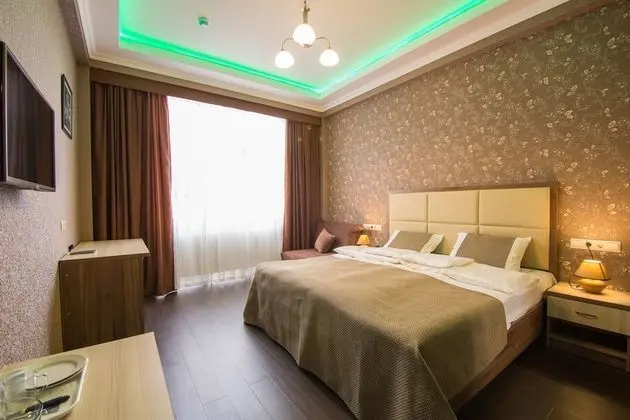 Deluxe Tek Büyük veya İki Ayrı Yataklı Oda