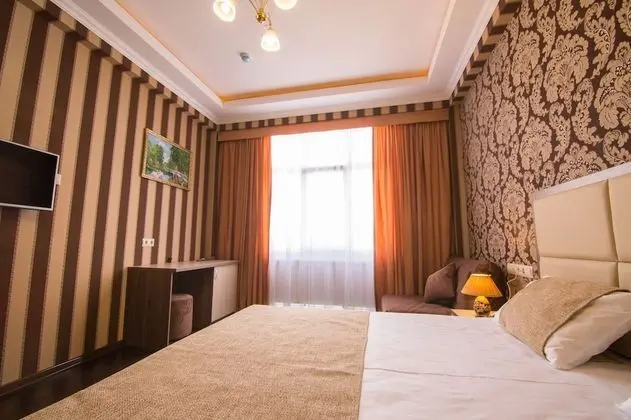 Deluxe Tek Büyük veya İki Ayrı Yataklı Oda