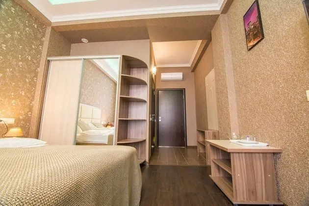 Deluxe Tek Büyük veya İki Ayrı Yataklı Oda