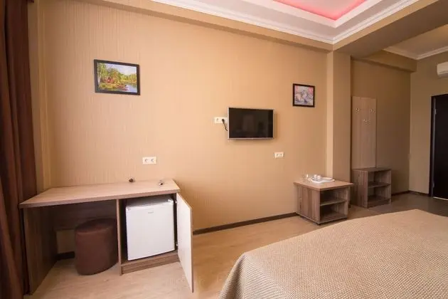 Deluxe Tek Büyük veya İki Ayrı Yataklı Oda