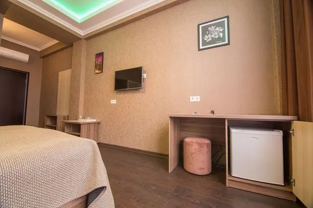 Deluxe Tek Büyük veya İki Ayrı Yataklı Oda