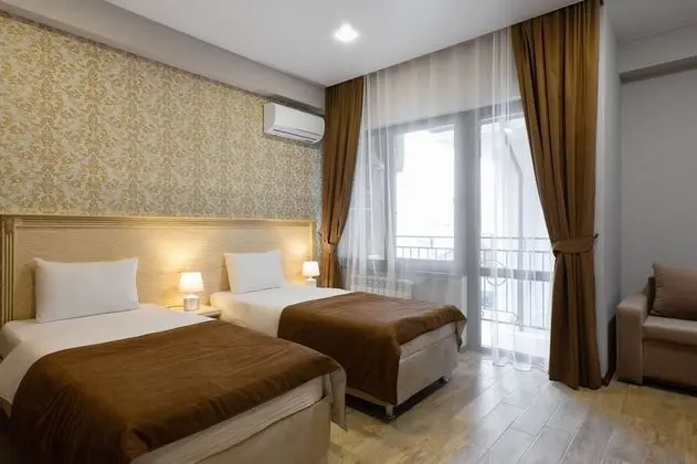 Standard Tek Büyük veya İki Ayrı Yataklı Oda, Balkon