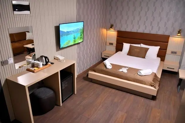 Suite, Şehir veya Dağ Manzaralı
