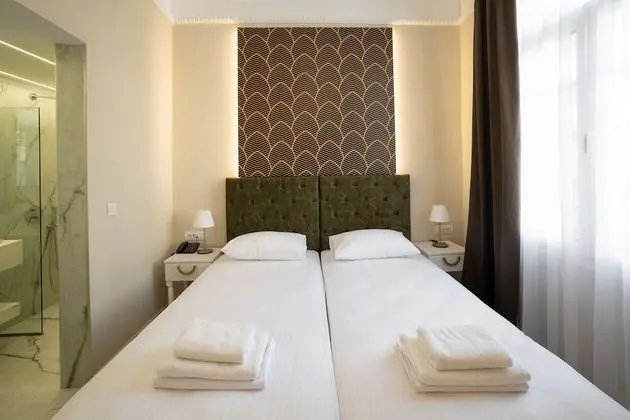 Deluxe Tek Büyük veya İki Ayrı Yataklı Oda