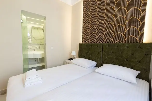 Deluxe Tek Büyük veya İki Ayrı Yataklı Oda