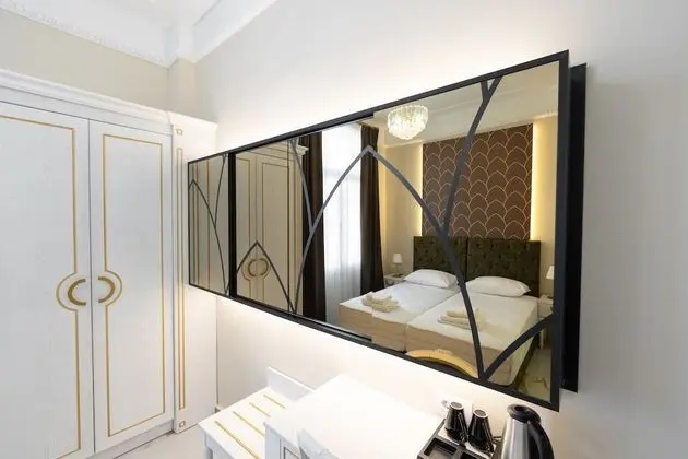 Deluxe Tek Büyük veya İki Ayrı Yataklı Oda