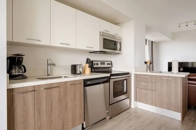 Deluxe One Bedroom Apartment with Den and Balcony