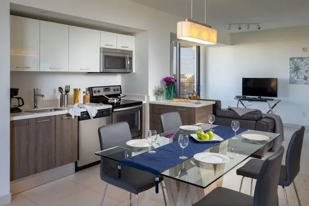 Deluxe One Bedroom Apartment with Den and Balcony