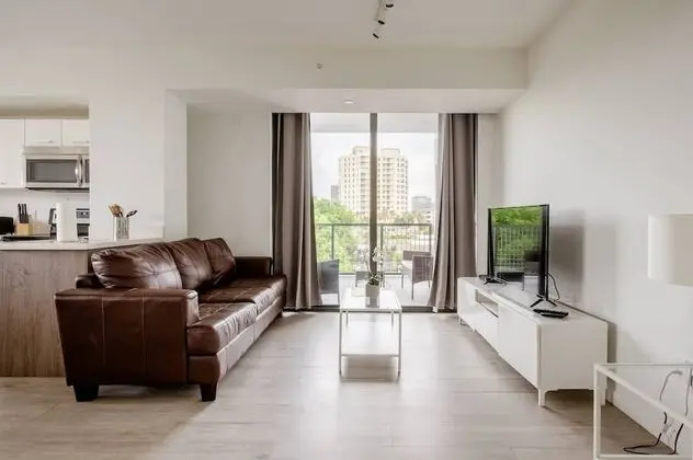 Deluxe One Bedroom Apartment with Den and Balcony