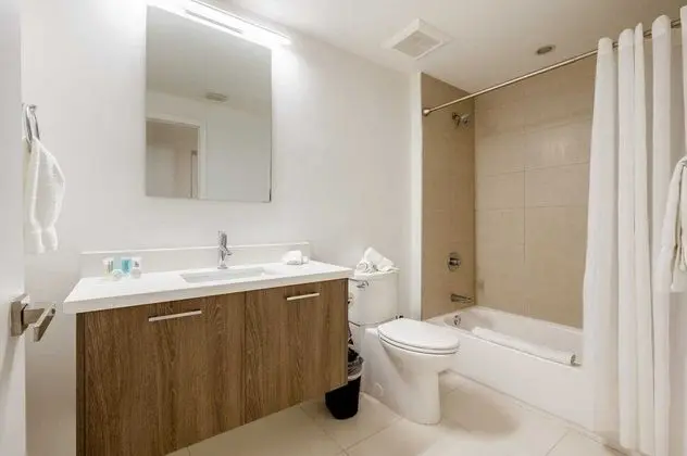 Deluxe One Bedroom Apartment with Den and Balcony