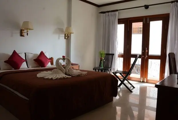 Deluxe Tek Büyük veya İki Ayrı Yataklı Oda