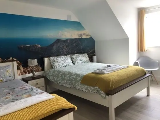 Premium Üç Kişilik Oda, Birden Çok Yatak, Banyolu/Duşlu, Bahçe Manzaralı