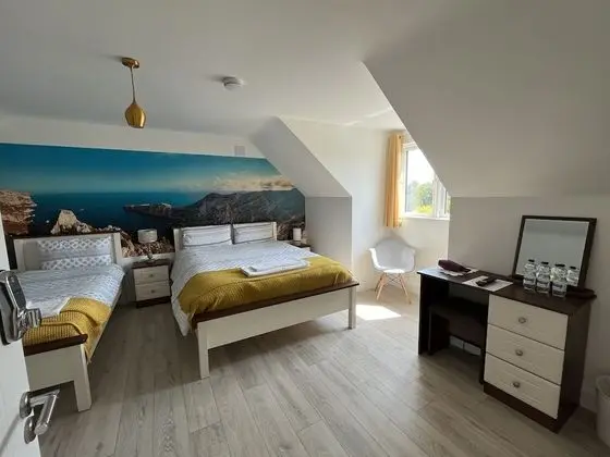 Premium Üç Kişilik Oda, Birden Çok Yatak, Banyolu/Duşlu, Bahçe Manzaralı