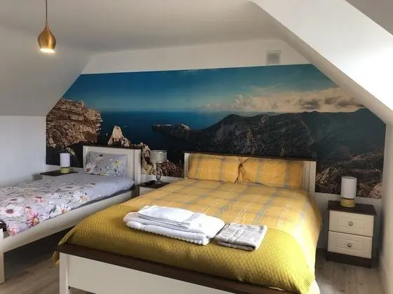 Premium Üç Kişilik Oda, Birden Çok Yatak, Banyolu/Duşlu, Bahçe Manzaralı