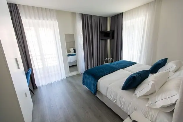 Deluxe Tek Büyük veya İki Ayrı Yataklı Oda