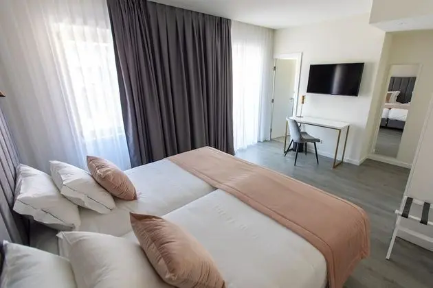 Deluxe Tek Büyük veya İki Ayrı Yataklı Oda