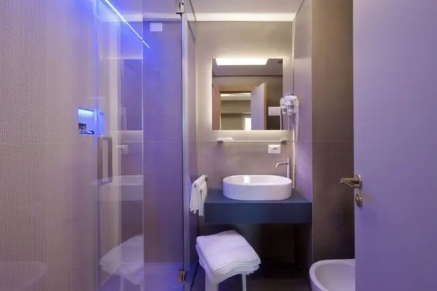 Deluxe Tek Büyük veya İki Ayrı Yataklı Oda (vasca idromassaggio all'aperto)