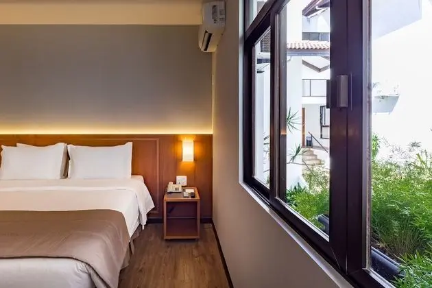 Deluxe Tek Büyük veya İki Ayrı Yataklı Oda