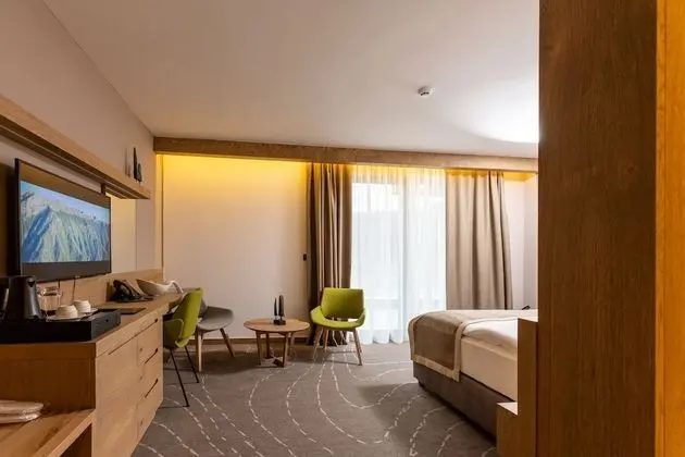 Deluxe Tek Büyük veya İki Ayrı Yataklı Oda