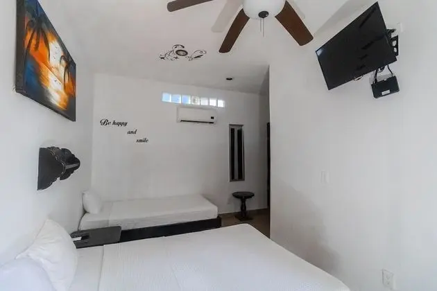 Standard Tek Büyük Yataklı Oda, Birden Çok Yatak, Sigara İçilmez, Havuz Manzaralı (Junior Suite)