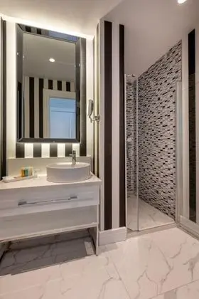 Deluxe Üç Kişilik Oda , Bahçe Manzaralı