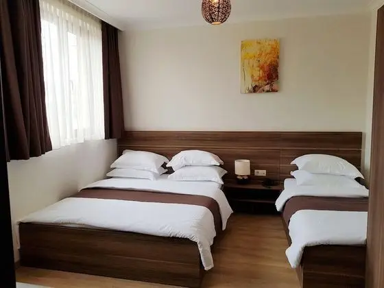 Standard Üç Kişilik Oda, Bahçe Manzaralı