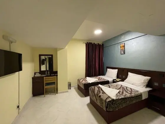 Deluxe Tek Büyük veya İki Ayrı Yataklı Oda