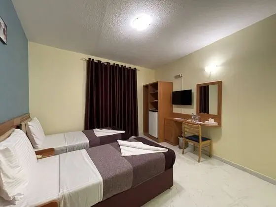 Deluxe Tek Büyük veya İki Ayrı Yataklı Oda