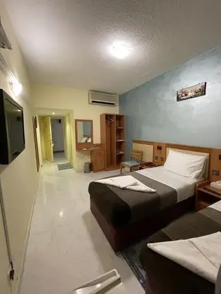 Deluxe Tek Büyük veya İki Ayrı Yataklı Oda
