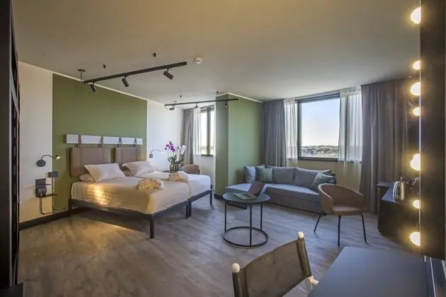 Deluxe Tek Büyük veya İki Ayrı Yataklı Oda