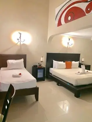 Suite Deluxe 1 Cama grande y 1 individual