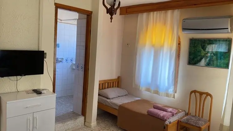 3 kisilik . Klimali . Balkonlu