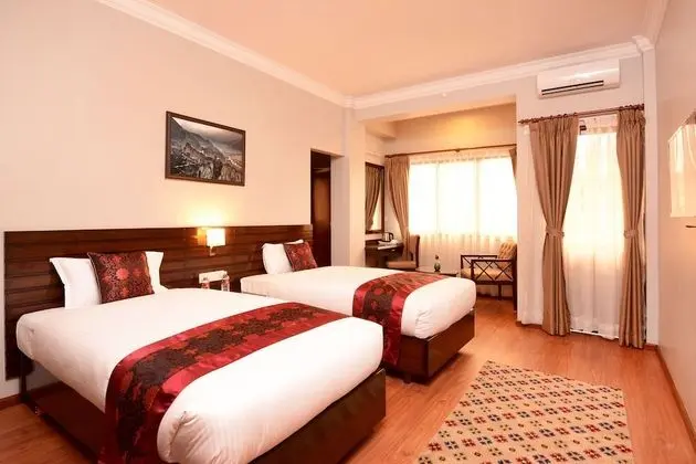 Deluxe Tek Büyük veya İki Ayrı Yataklı Oda