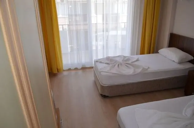 Üç Kişilik Oda
